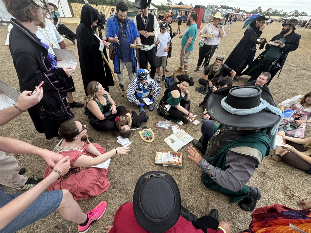 Ren Faire Patrons playing a Role Playing Game